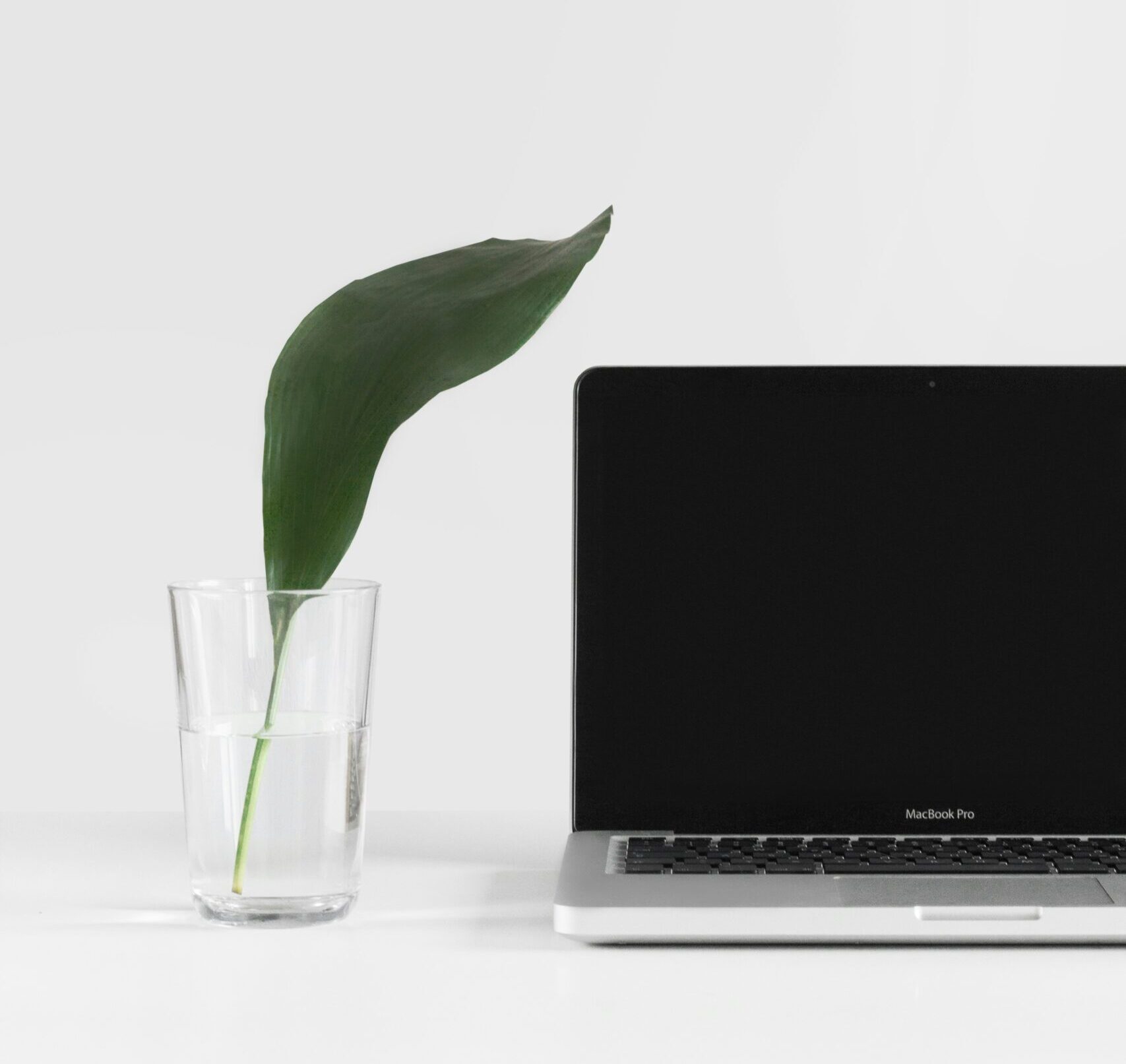 Laptop and home office setup symbolising online therapy sessions available across Australia.